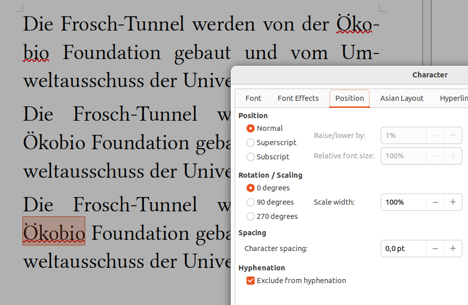 With the new “Exclude from hyphenation” formatting in paragraph 3, the word “Ökobio” keeps spell checking and text layout: “Ö” (O with umlaut) gets wide dots only in German because of locale-dependent font features of Linux Libertine (Display G)